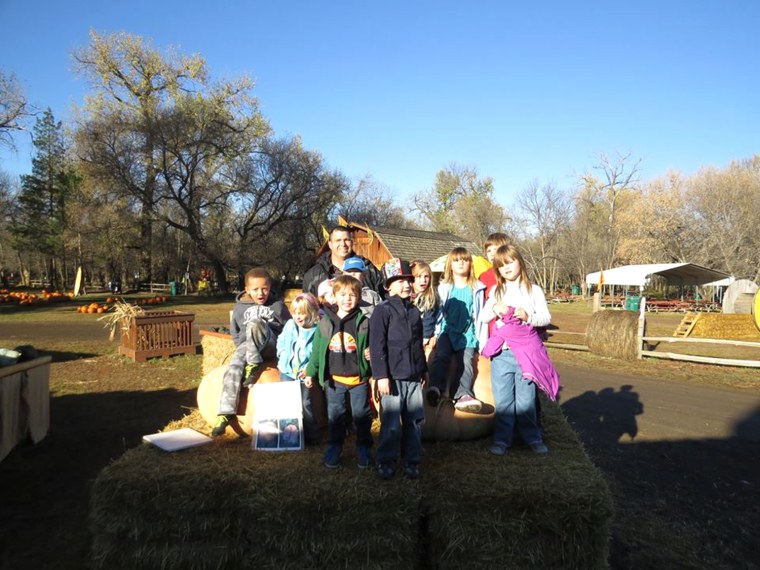 Joshua Smith and his students at In-side-Out Early Learning school in North Dakota.