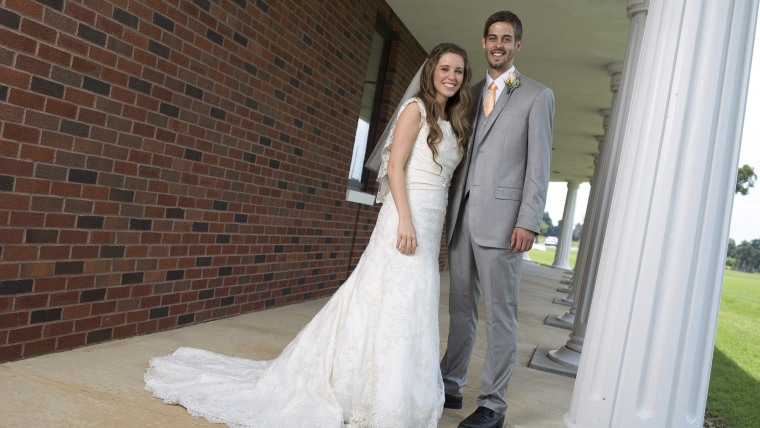 First comes love (and supervised courtship), then comes marriage, then comes (lots and lots of) babies in a baby carriage. Jill and Derick wed on June 21 in Arkansas.