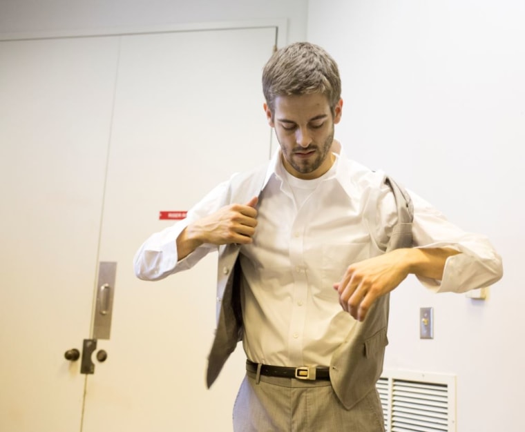 Derick Dillard gets dressed before his wedding to Jill Duggar; the couple is now expecting their first child together.