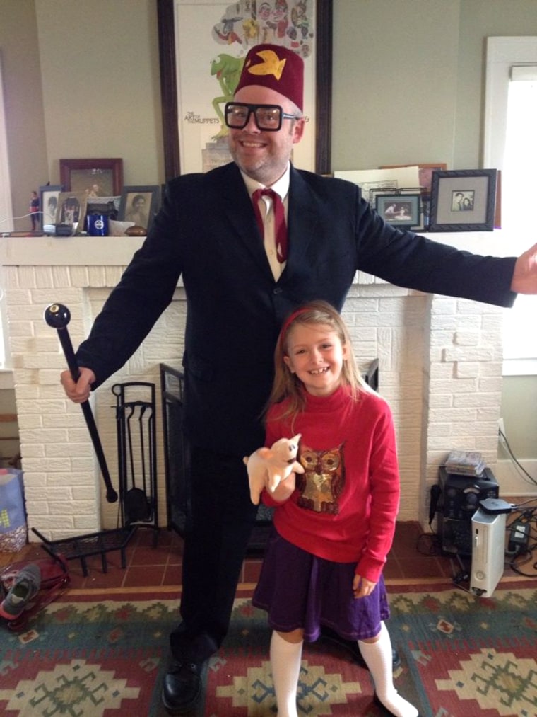 Tom Burns and his daughter always dress up in coordinated Halloween costumes: Here they are as Mabel and Great Uncle Stan (aka Grunkle Stan), characters in the animated children's series \"Gravity Falls.\"