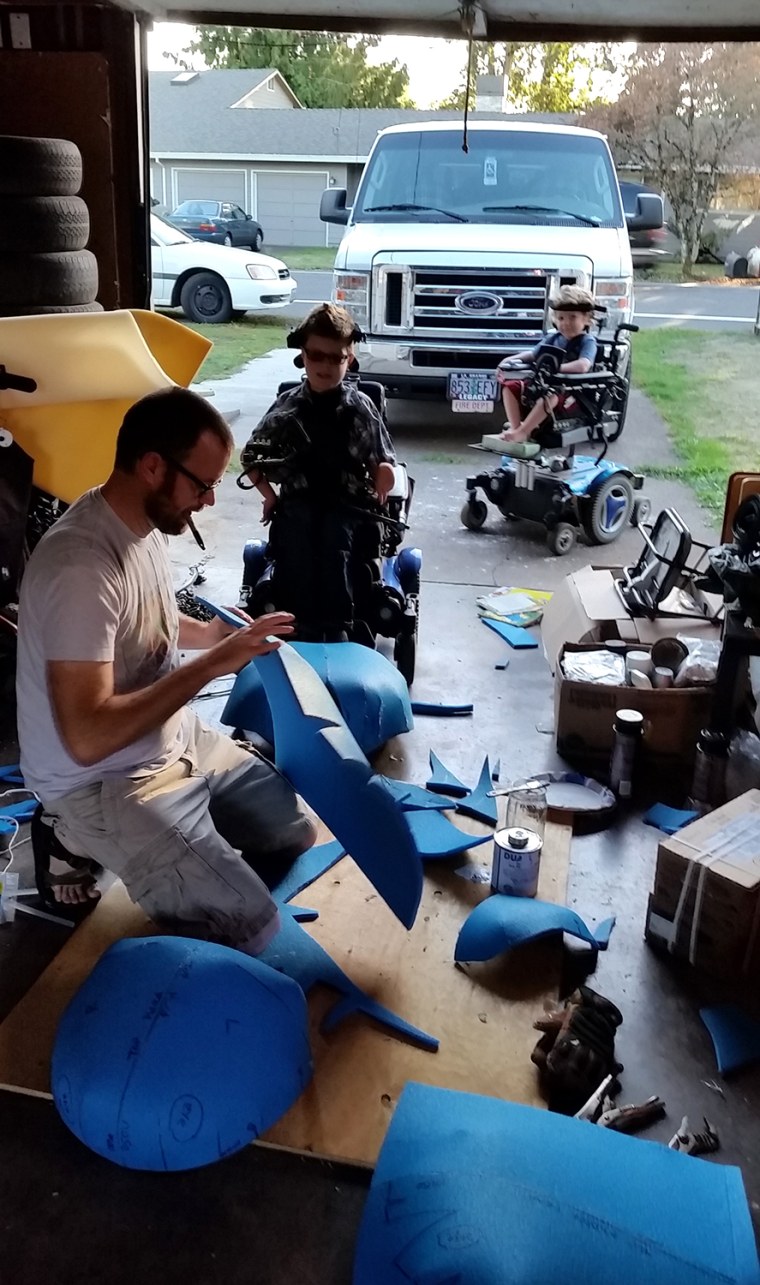 Three days into the process of making the Toothless costume, Ryan Weimer experiments with a prototype of his design, while Keaton and Bryce assess his...