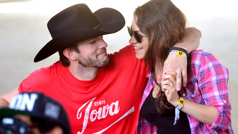 Pre-parent days: Ashton Kutcher and Mila Kunis at 2014 Stagecoach: California's Country Music Festival in California.