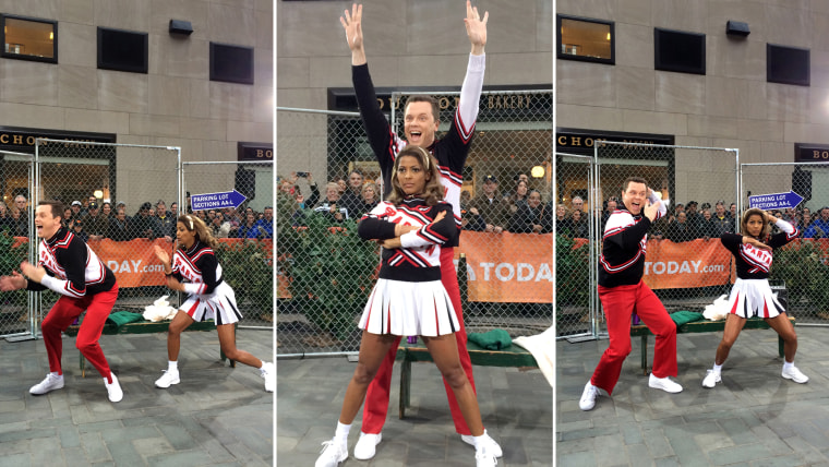 Willie Geist and Tamron Hall as the Spartan cheerleaders.