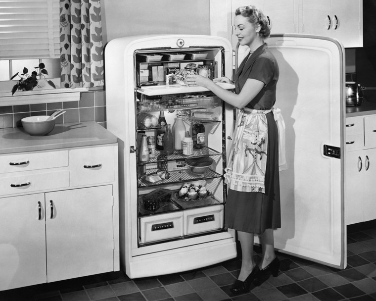 Woman with open refrigerator; Shutterstock ID 99385886; PO: TODAY.com