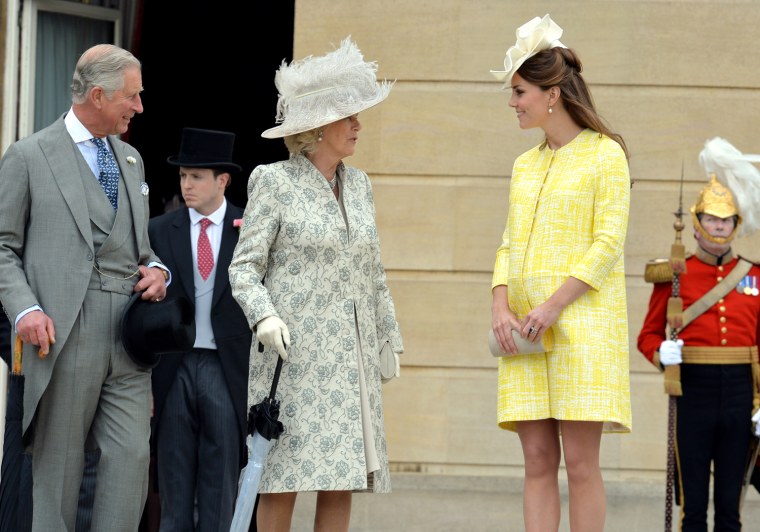 Prince Charles, the Prince of Wales (L), Camilla, the Duchess of Cornwall (C) and Catherine, the Duchess of Cambridge attend a Garden Party in the gro...