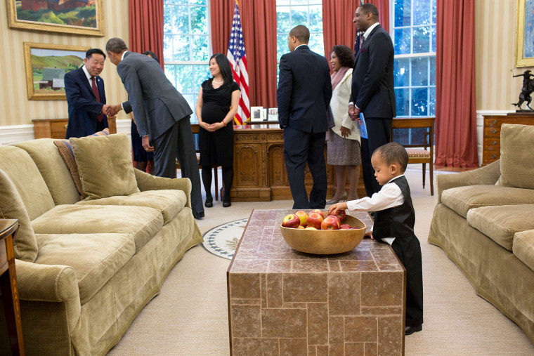 President Barack Obama greets the family of departing staff member Nik Smith, Confidential Assistant to the Administrator for Federal Procurement Poli...