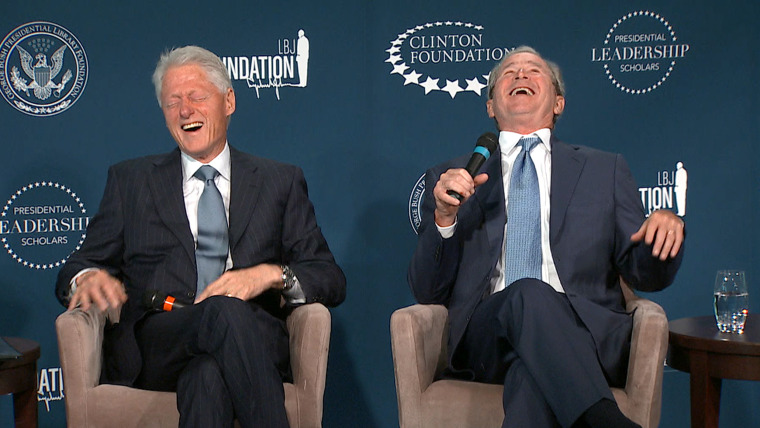 Former Presidents Bill Clinton and George W. Bush share a laugh Monday.