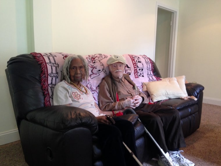 This photo taken Aug. 5, 2014 shows 96-year-old Edith Hill and 95-year-old Eddie Harrison in their home in Annandale, Va. The two have been companions...