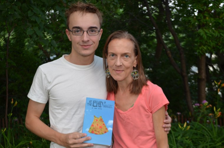 Mary Petrie and her son Stryker, holding the novel that she never thought would see the light of day.