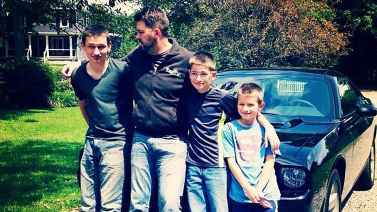 Ron Mattocks and his three sons.