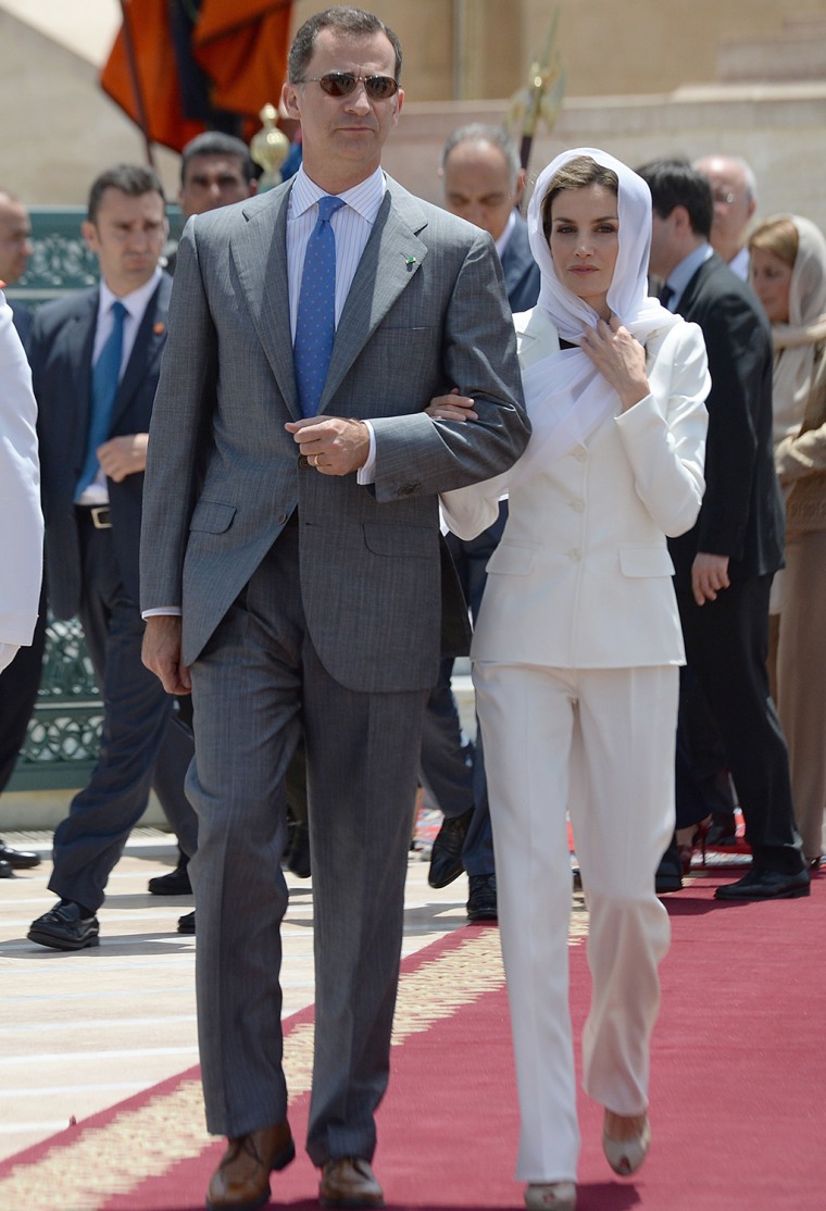 Spain's King Felipe VI (L) and his wife Queen Letizia arrive to visit the Mohamed V mausoleum in Rabat on July 15, 2014 .The new King and Queen of Spa...