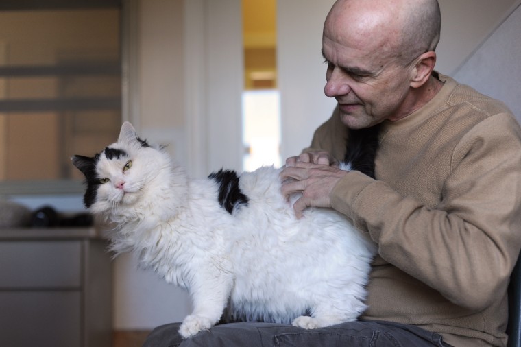 Dr. Frank McMillan with a cat