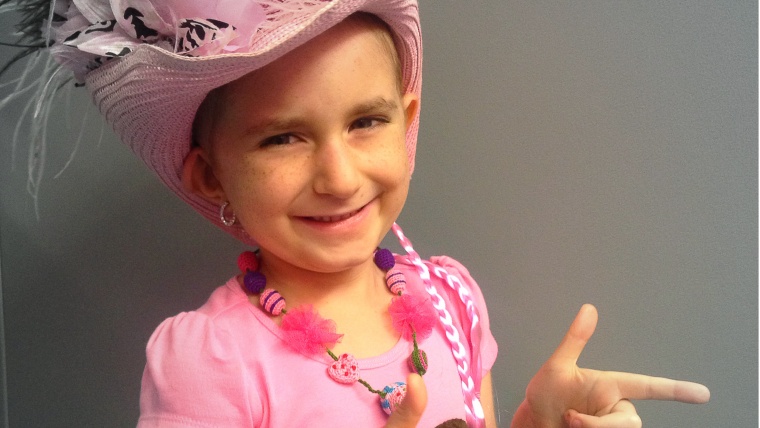 Brooke Hester poses before attending the Sept. 13 Miranda Lambert concert. Brooke wore a pink cowboy hat adorned with a blossom that she'd later hand ...