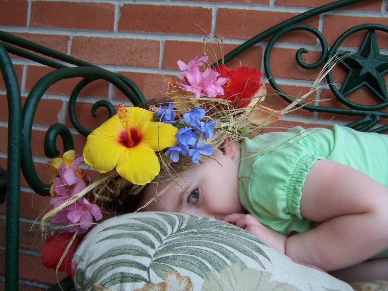 Before her neuroblastoma diagnosis, Brooke enjoyed picking flowers at home and wearing them in her hair.