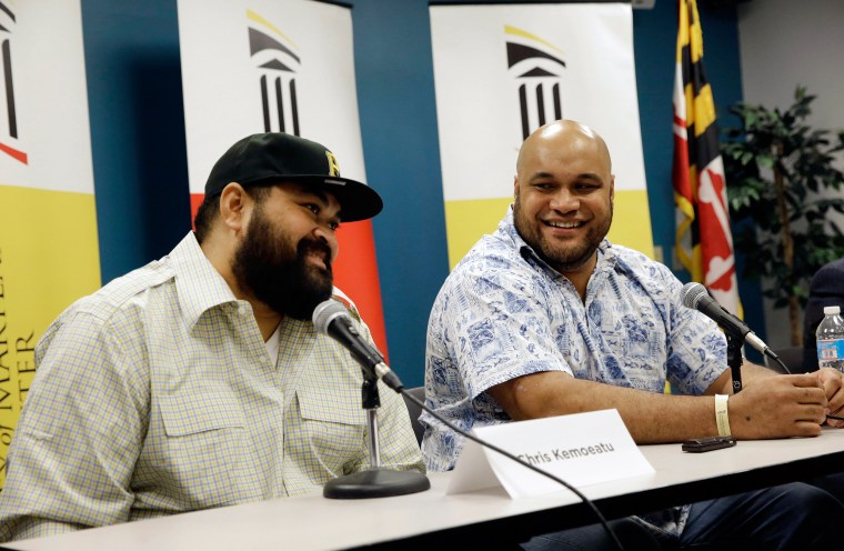 IMAGE: Chris Kemoeatu, left, and his brother Ma'ake