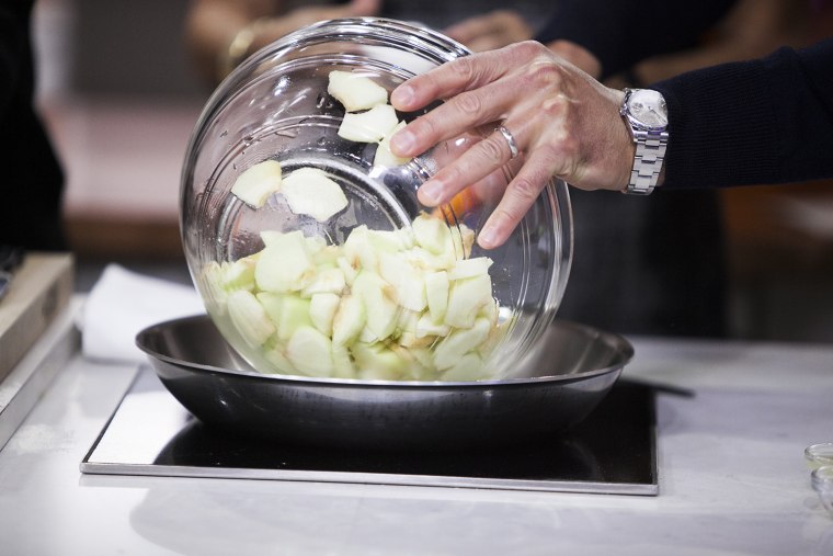 Paula Deen and her two sons Bobby and Jamie, along with Kathy Lee Gifford and Hoda Kotb, make fried apple pies on the TODAY show in New York, on Sept....