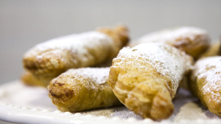 Paula Deen and her two sons Bobby and Jamie, along with Kathy Lee Gifford and Hoda Kotb, make fried apple pies on the TODAY show in New York, on Sept....