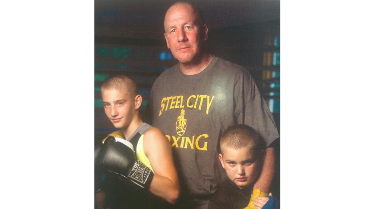 Pittsburgh Detective Jack Mook with the two boys who are now his sons,  Joshua, left, and Jessee.