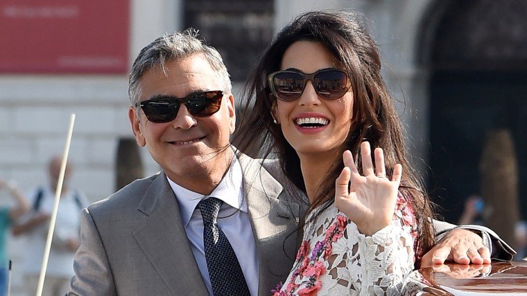 George Clooney and Amal Alamuddin leave the Aman Hotel on September 28, 2014 in Venice, Italy.