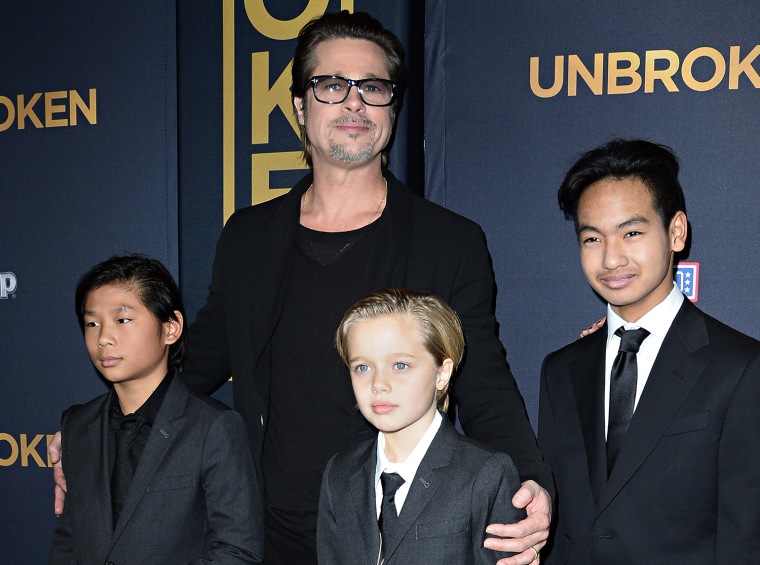 Image: Brad Pitt and children Pax, Shiloh and Maddox attend the U.S. premiere of \"Unbroken.\"