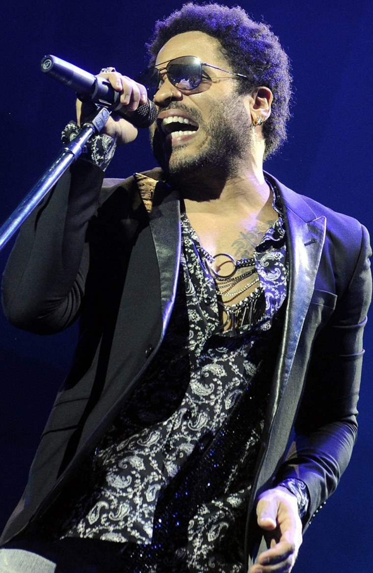 epa04533103 US singer Lenny Kravitz performs on stage during a concert at the Stadthalle in Vienna, Austria, 17 December 2014. Kravitz sings also song...