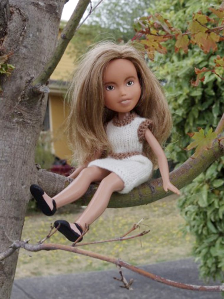 Singh has situated many of her Tree Change Dolls in outdoor settings to make them appear like they're \"playing outside the way kids should.\"