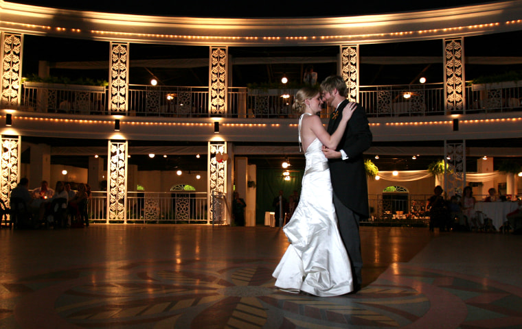 Carissa and Chris Ray dance at their wedding in 2006