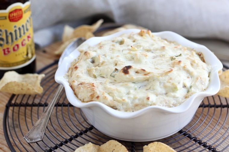 Cheesy beer caramelized onion and artichoke dip