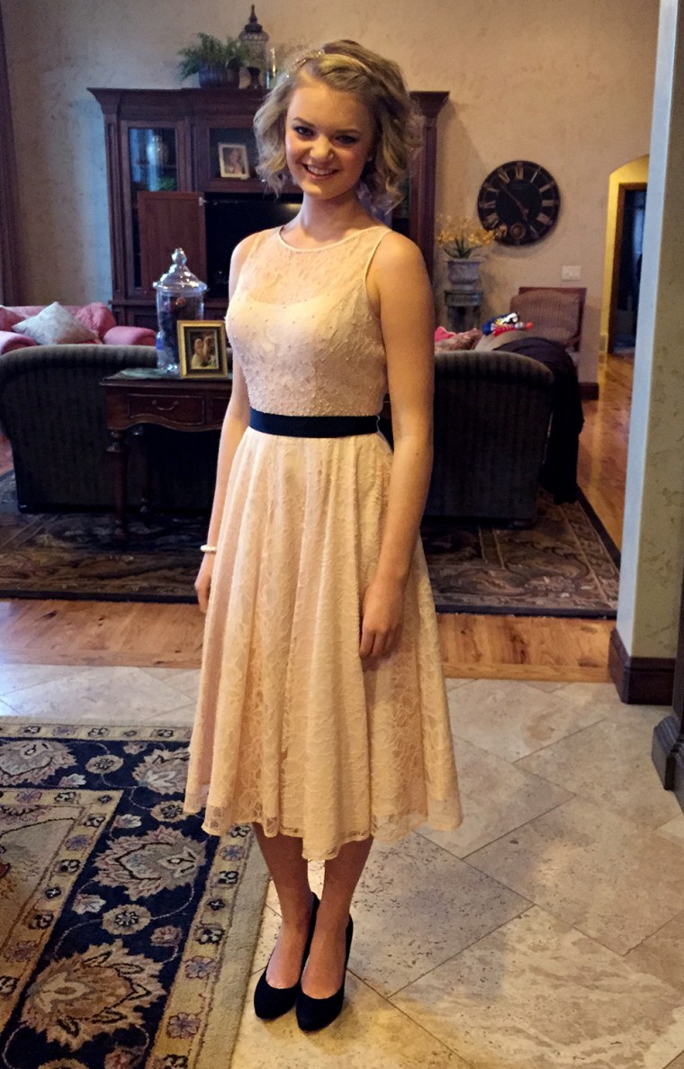 A school official said this dress worn at a Utah school dance by Gabi Finlayson violated dress code rules about shoulder strap width.