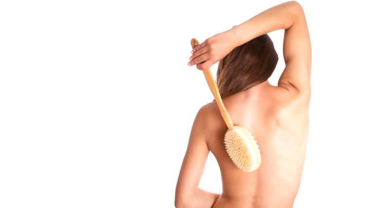 Photo of the woman with brush on back; activity; adult; affectionate; back; background; bathtub; beautiful; beauty; body; brown; brush; care; cosmetic...