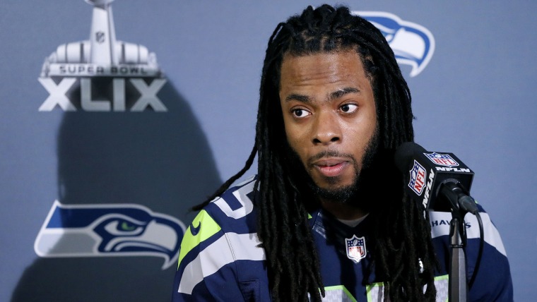 Seattle Seahawks' Richard Sherman answers a question at a news conference for NFL Super Bowl XLIX football game, Wednesday, Jan. 28, 2015, in Phoenix....