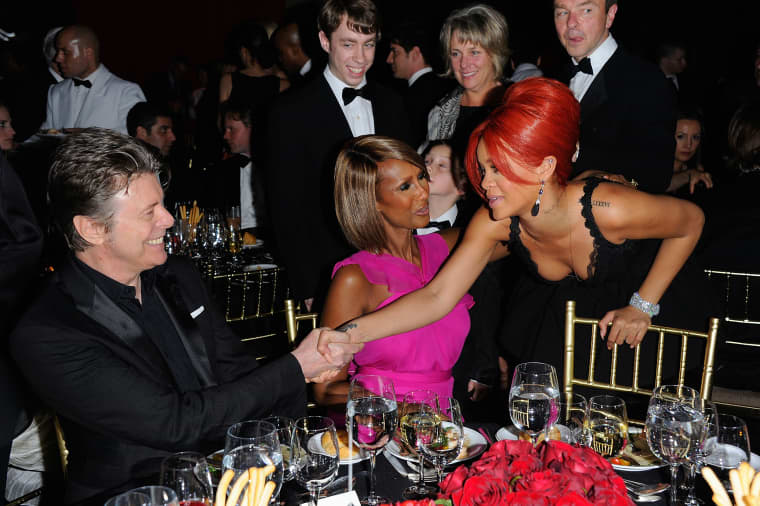 Image: Supermodel Iman (center) introduces her husband David Bowie to Rihanna