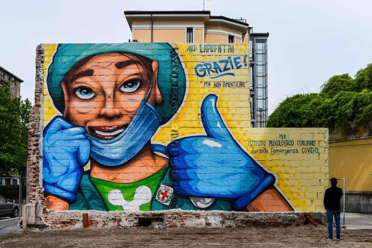 Image: ITALY-HEALTH-VIRUS-MURAL