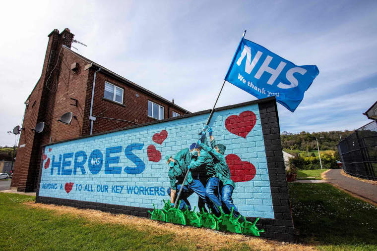 Image: BRITAIN-NIRELAND-HEALTH-VIRUS-MURALS-NHS
