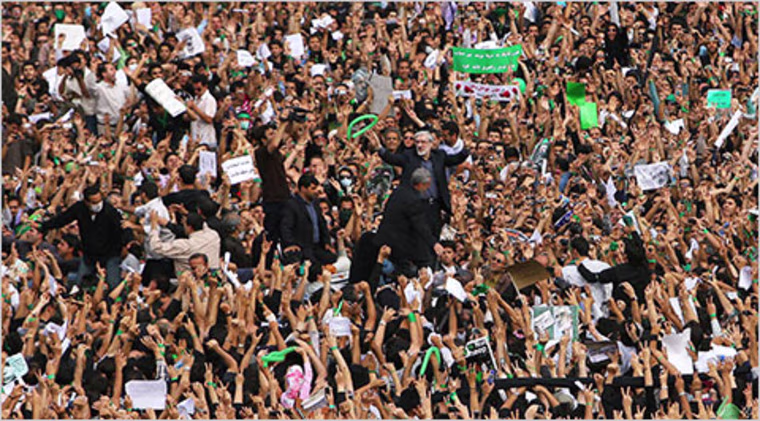 Mir Hussein Moussavi and supporters at a rally on Thursday in Tehran.