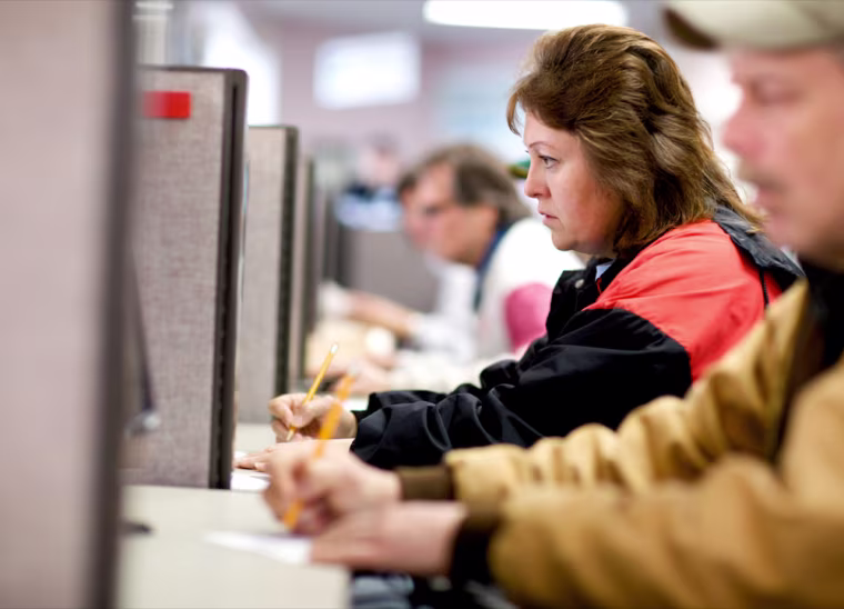 Kelli Lord uses the computer to look or food service jobs at the Worksource Portland Metro Employment Center in Portland, Ore on March 31, 2009.

Craig Mitchelldyer/for MSNBC.com