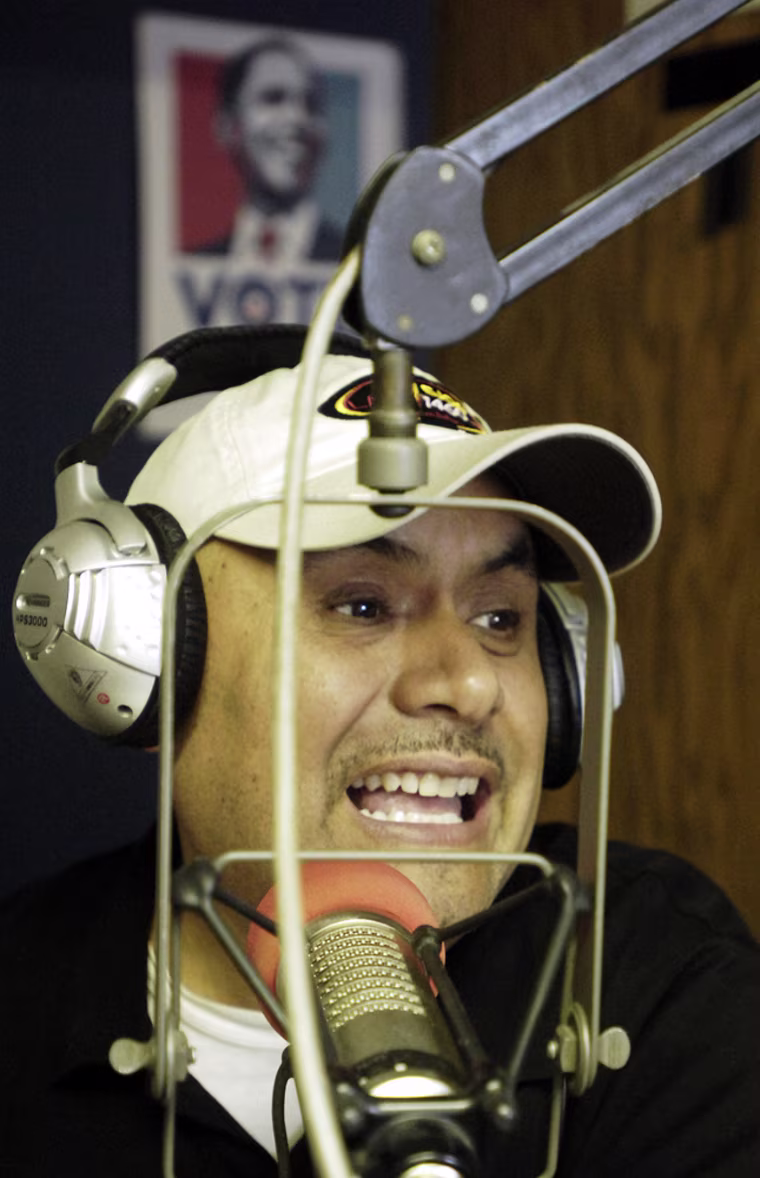 Truth Photo By Jennifer Shephard Nacho Zepeda, General Manager at WKAM talks to listeners during a call-in segment of his morning show Thursday, May 28, 2009.