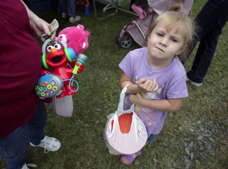 Image: Child at a yard sale
