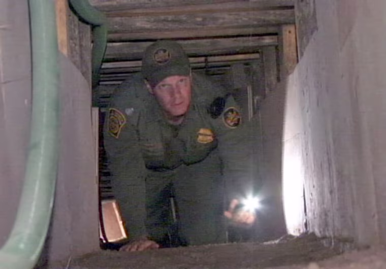 Image: Man with flashlight