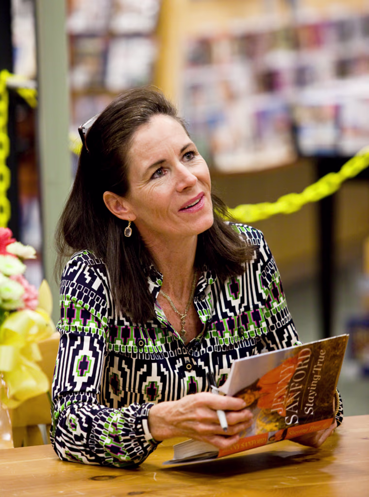 Image: Jenny Sanford signs copies of her book