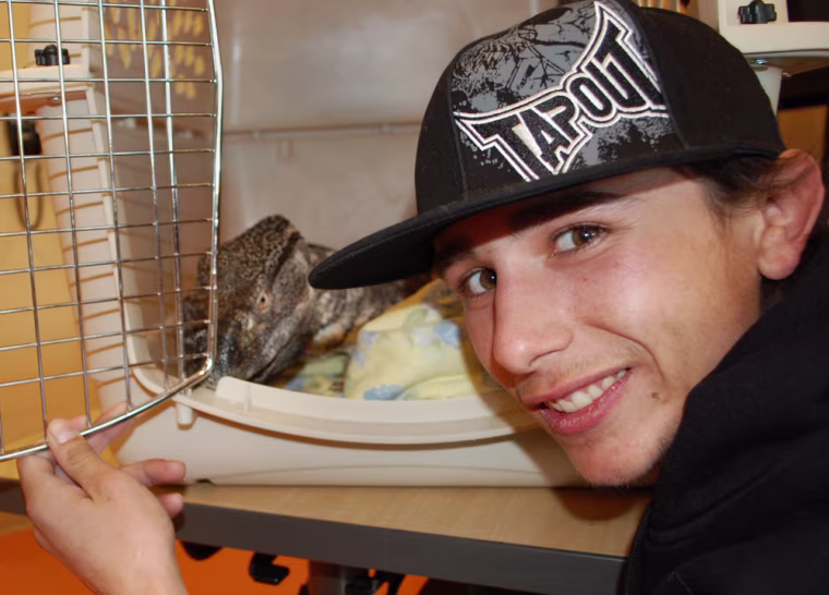 Image: Elmer the lizard and Tom Casarez Jr.