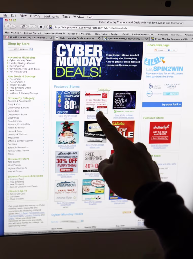 Image: Carol Uyeno looks at Cyber Monday sales on her computer at her home in Palo Alto, Calif.