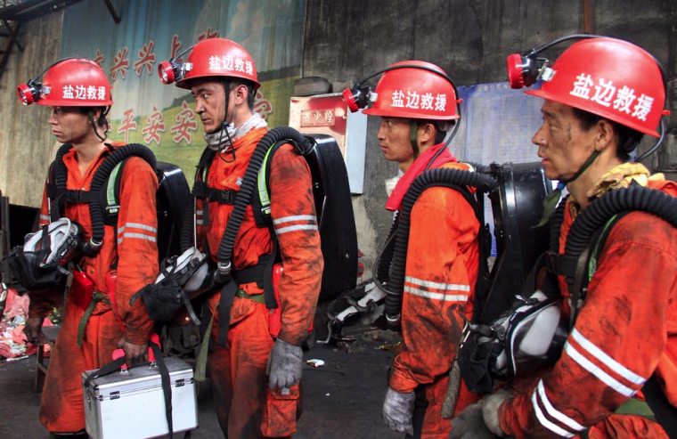 Image: Rescuers prepare to head to search for survivers at a coal mine after a gas explosion in Panzhihua, southwest China's Sichuan province