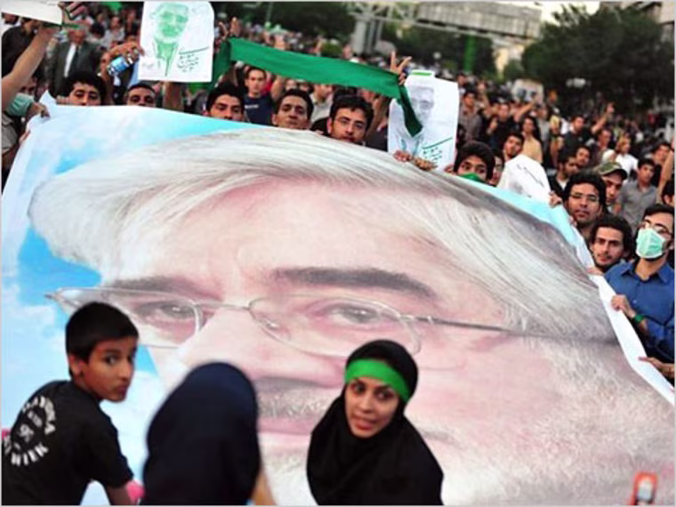 A photograph uploaded to TwitPic by a blogger who says that it shows a silent demonstration in Tehran’s Topkhone Square on Thursday.