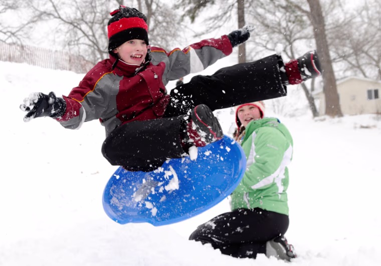 Image: Kids enjoy sledding in St. Paul