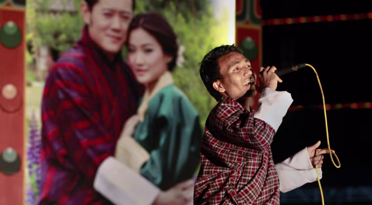 Image: A singer competes in Bhutan