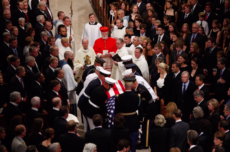 Image: The casket of Senator Edward Kennedy is brought into Our Lady of Perpetual Help Basilica in Boston