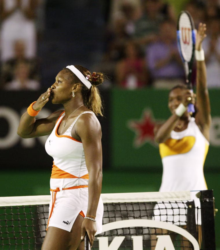 SERENA WILLIAMS OF THE US BLOWS KISSES AFTER DEFEATING SISTER VENUS IN
AUSTRALIAN OPEN FINAL.