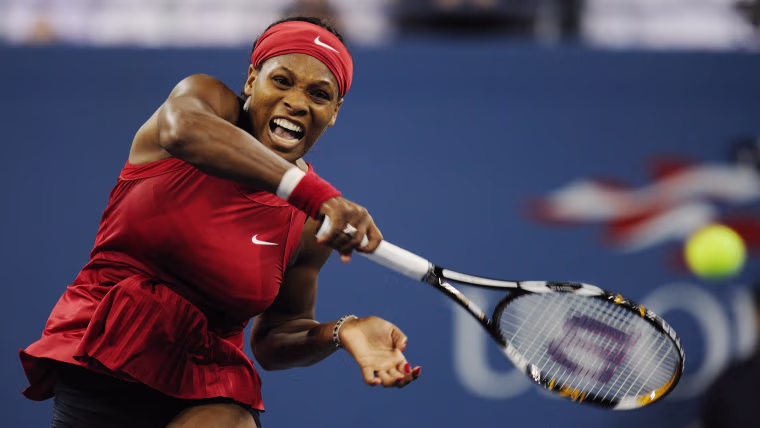 Serena Williams of the US smashes a retu