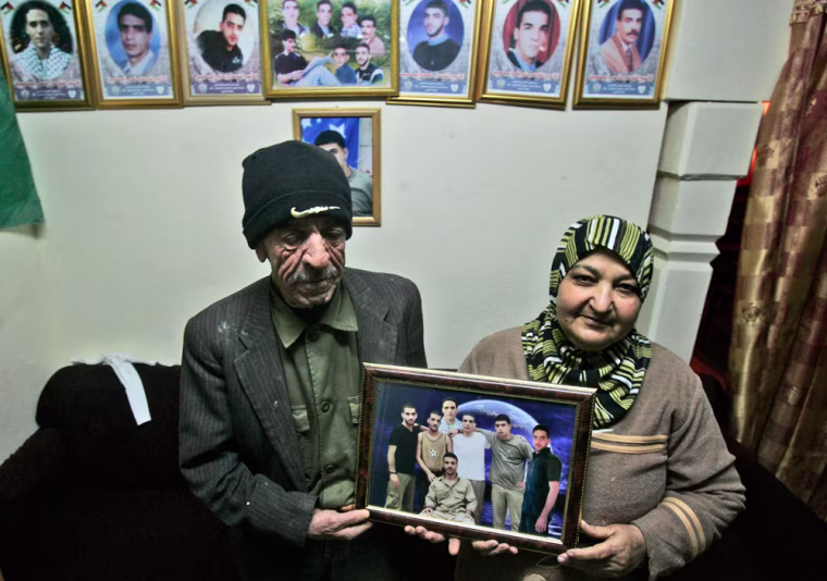 Image: Palestinian Mohammed Naji  and wife Latifah are seen at their home in the West Bank city of Ramallah.